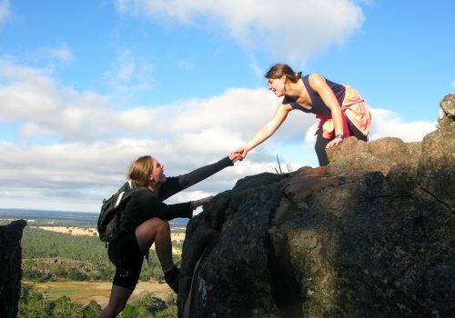 Two students mountain climbing in Australia